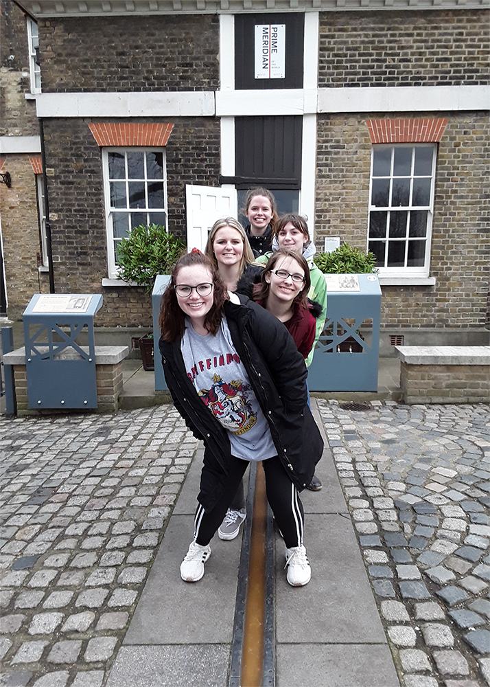 Penn State Wilkes-Barre honors students straddling the Prime Meridian in Greenwich, England